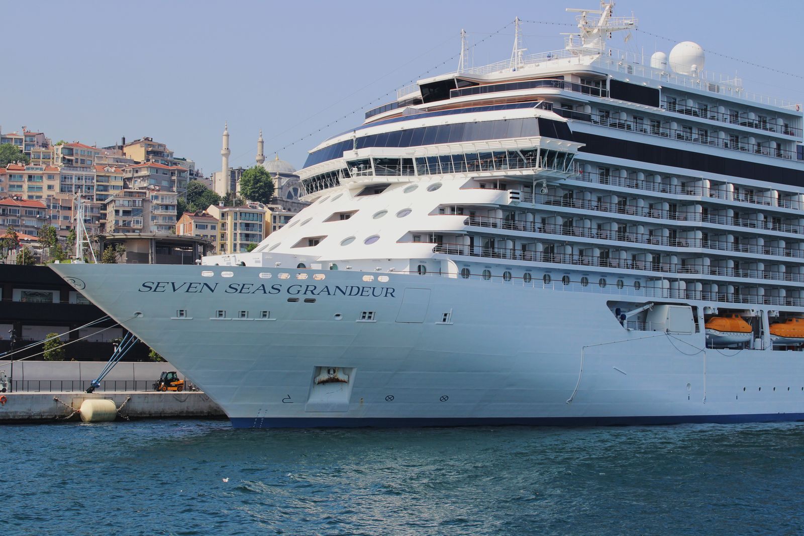 Regent Seven Seas ship Seven Seas Grandeur moored in Istanbul, one of the cruise lines owned by Norwegian Cruise Line Holdings